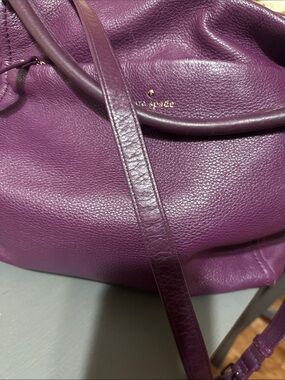 kate spade plum pebbled leather crossbody with gold logo